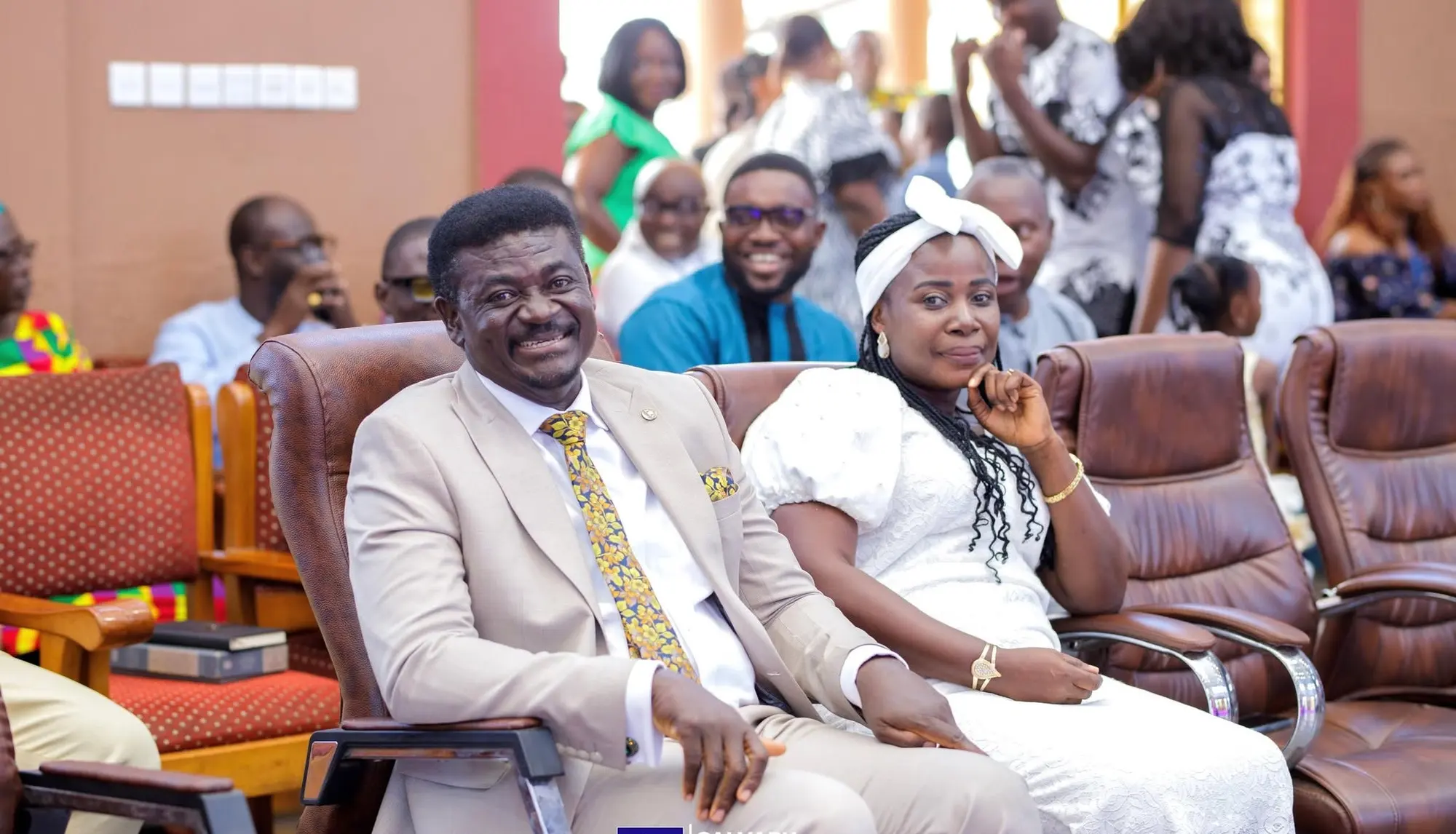 Seated in the front row during a service at Calvary Redemption Church